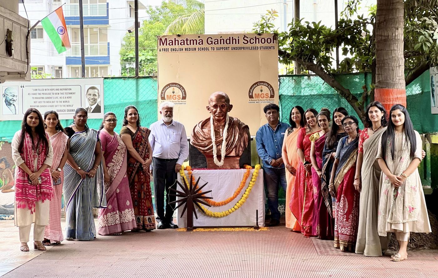 School community gathered at the Gandhi statue